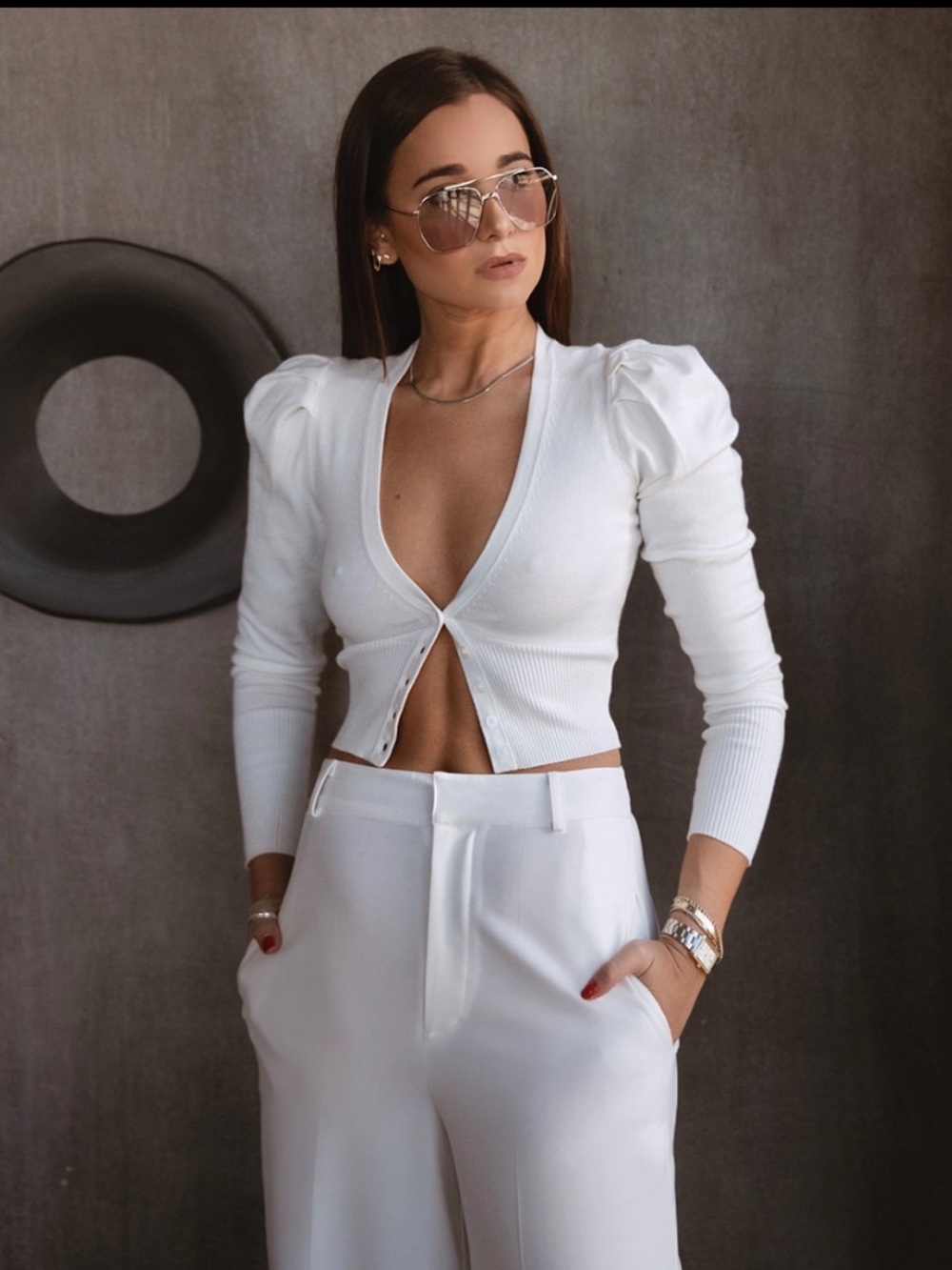 DANIELLE BERNSTEIN: White Puff-Sleeve Ribbed V-Neck Cardigan